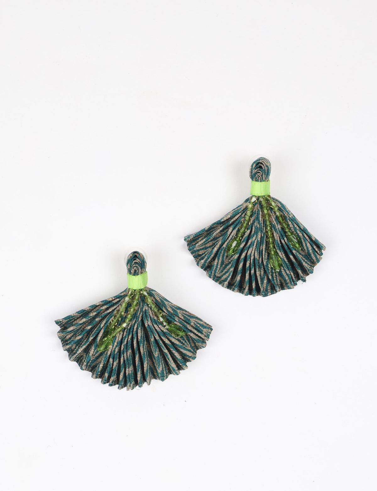 Green abstract pleated fabric earrings with green bead embellishments and lime green band, shown flat on white background