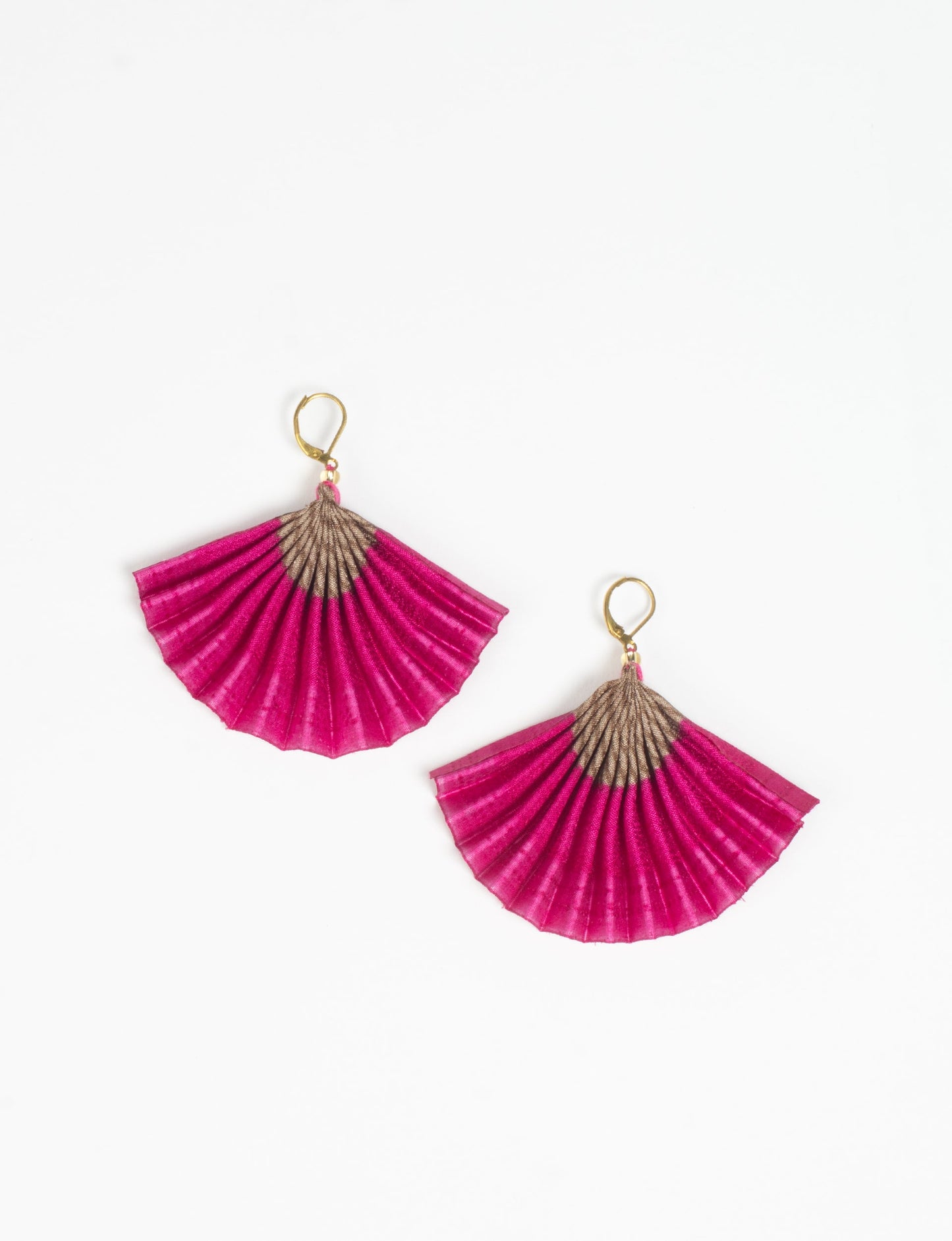 Elevate your style sustainably with our PLEATED EARRINGS – a timeless creation from pre-loved Indian saris, crafted using innovative heat setting techniques. Align with ethical clothing, green fashion, and slow fashion, these earrings are a statement of mindful elegance. Hypoallergy tested metal hooks make them a skin-friendly, sustainable choice.