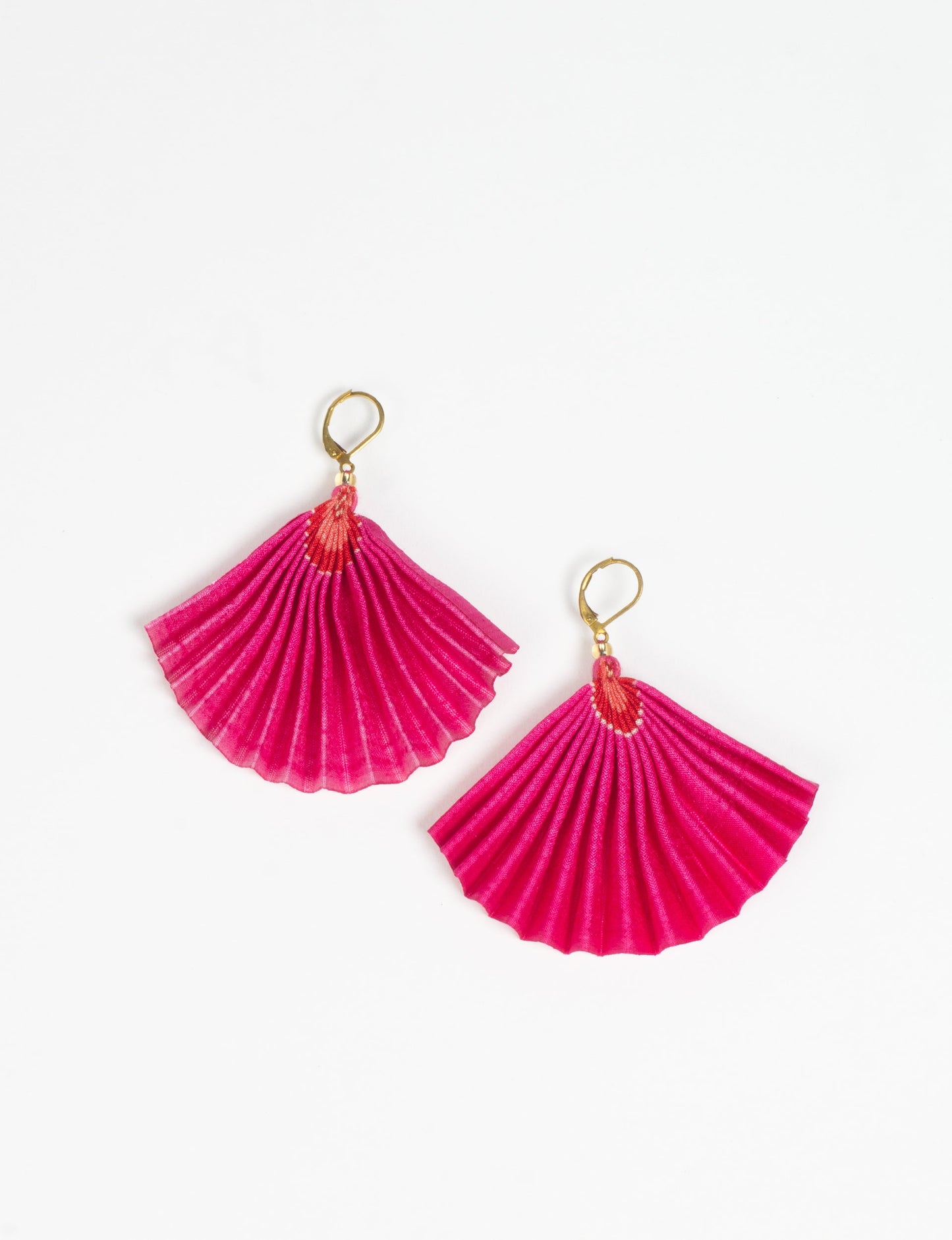 Elevate your style sustainably with our PLEATED EARRINGS – a timeless creation from pre-loved Indian saris, crafted using innovative heat setting techniques. Align with ethical clothing, green fashion, and slow fashion, these earrings are a statement of mindful elegance. Hypoallergy tested metal hooks make them a skin-friendly, sustainable choice.