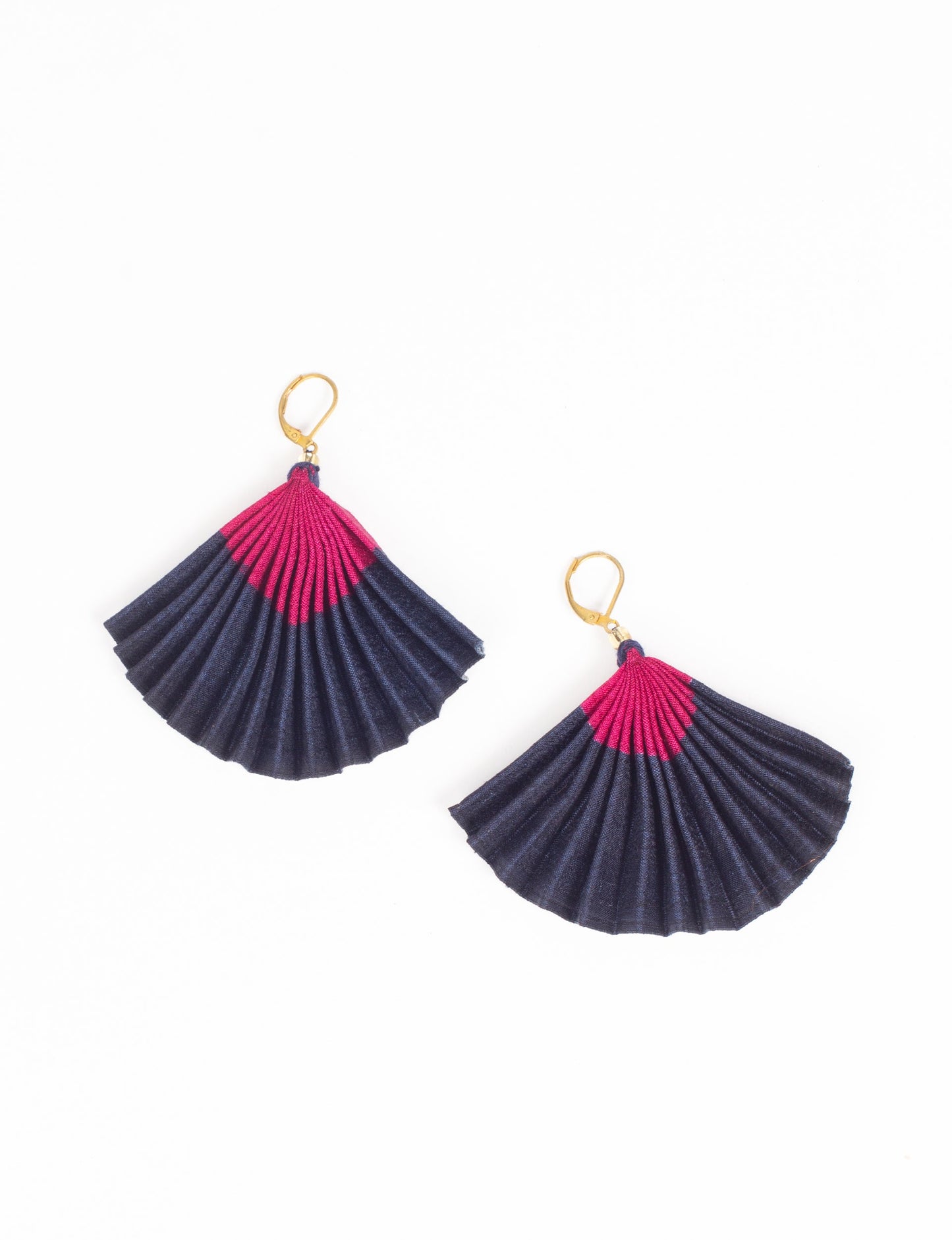 Elevate your style sustainably with our PLEATED EARRINGS – a timeless creation from pre-loved Indian saris, crafted using innovative heat setting techniques. Align with ethical clothing, green fashion, and slow fashion, these earrings are a statement of mindful elegance. Hypoallergy tested metal hooks make them a skin-friendly, sustainable choice.