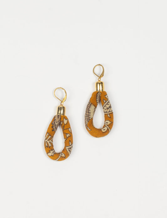 Elevate your style sustainably with our Rope Earrings. Crafted from cotton rope hand-wrapped with pre-loved saris, these earrings are a testament to ethical and green fashion. Make a conscious choice for a brighter, eco-friendly future.