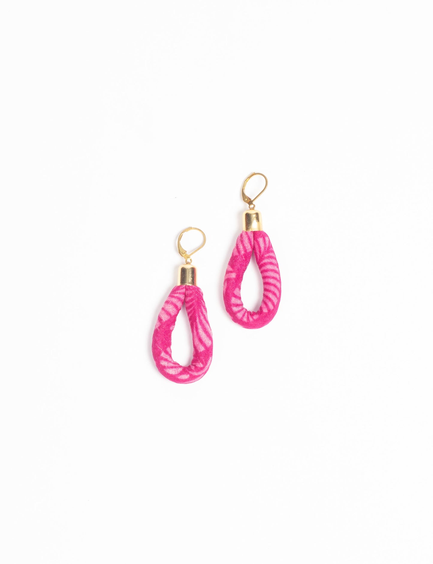 Elevate your style sustainably with our Rope Earrings. Crafted from cotton rope hand-wrapped with pre-loved saris, these earrings are a testament to ethical and green fashion. Make a conscious choice for a brighter, eco-friendly future.