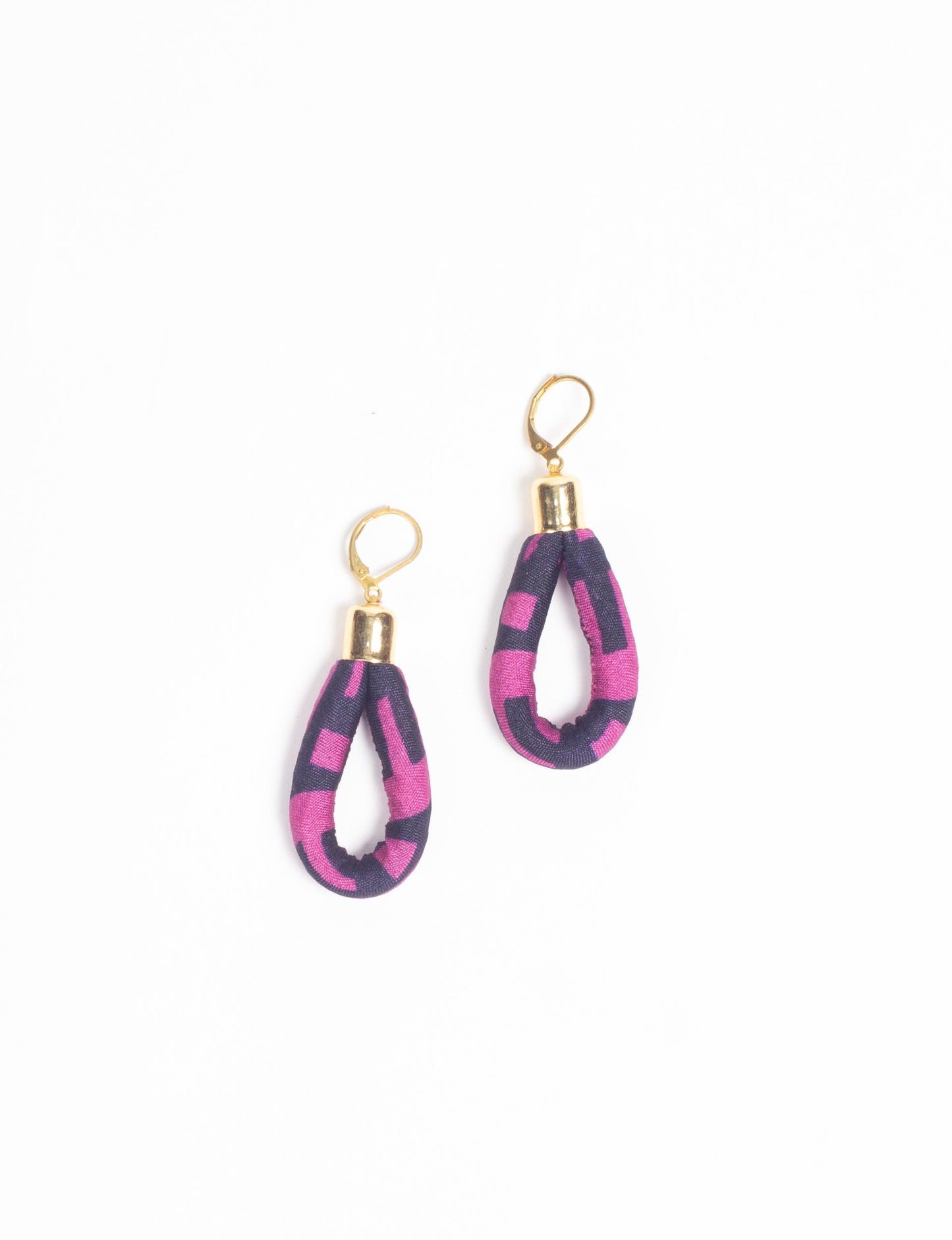 Elevate your style sustainably with our Rope Earrings. Crafted from cotton rope hand-wrapped with pre-loved saris, these earrings are a testament to ethical and green fashion. Make a conscious choice for a brighter, eco-friendly future.