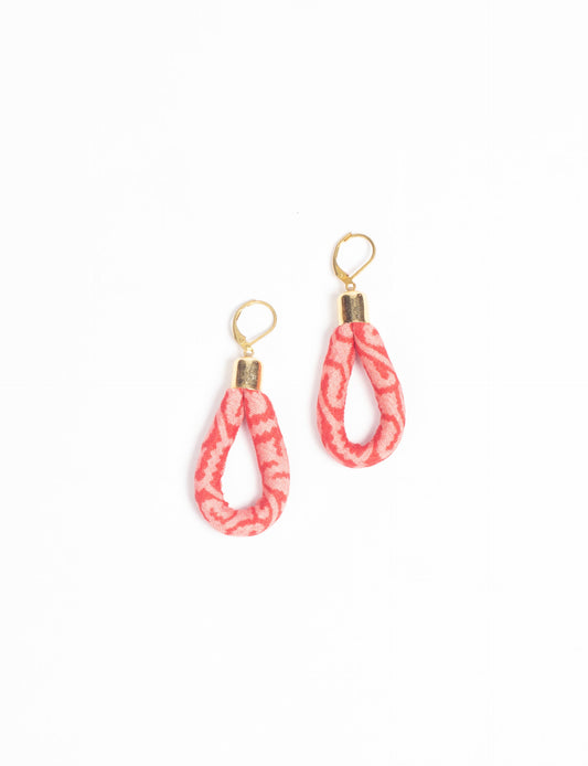 Elevate your style sustainably with our Rope Earrings. Crafted from cotton rope hand-wrapped with pre-loved saris, these earrings are a testament to ethical and green fashion. Make a conscious choice for a brighter, eco-friendly future.