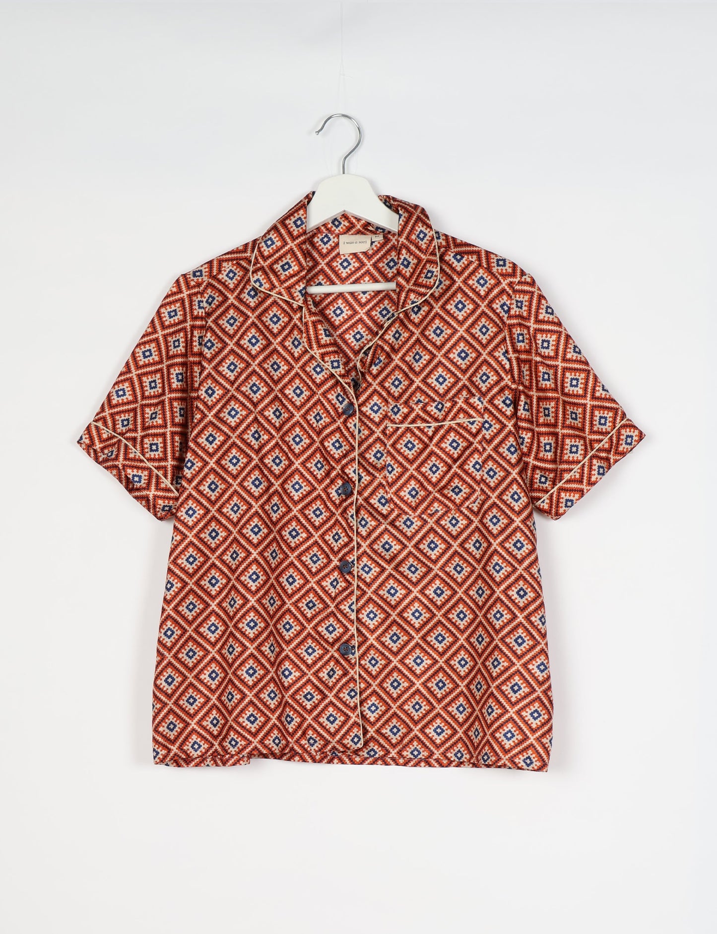 Indulge in comfort and style with our PJ Set Short, now with short sleeves. Crafted from upcycled saris, these shorts embody a zero-waste mentality for sustainable sleepwear. Versatile from day to night, perfect for beach lounging or poolside yoga, these pajamas redefine conscious fashion.