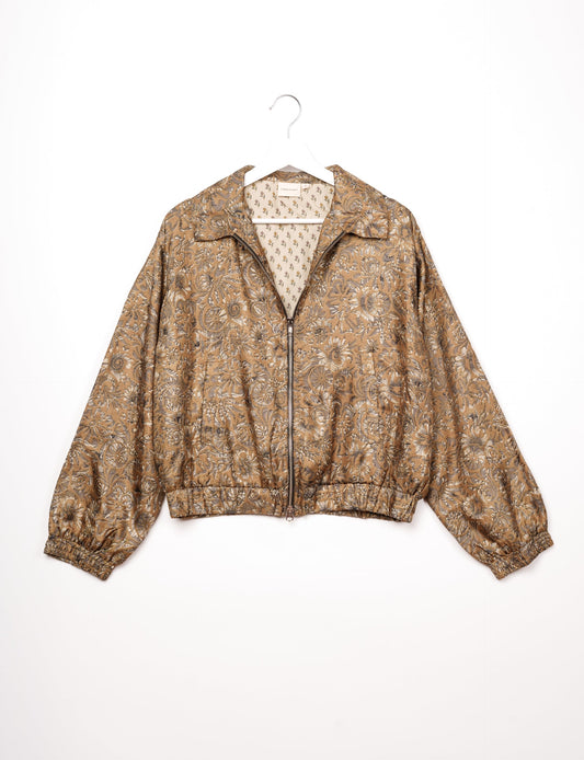 Stylish BOMBER JACKET, an upcycled clothing masterpiece with a cute cropped shape, elasticated details, and detachable metallic zipper. Contrast sari print lining adds a unique touch. Explore sustainable and eco-friendly fashion.