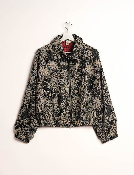 Stylish BOMBER JACKET, an upcycled clothing masterpiece with a cute cropped shape, elasticated details, and detachable metallic zipper. Contrast sari print lining adds a unique touch. Explore sustainable and eco-friendly fashion.