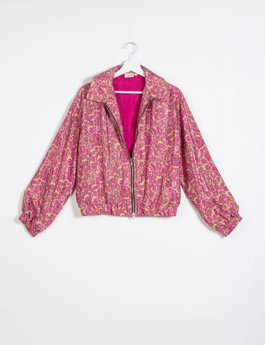 Stylish BOMBER JACKET, an upcycled clothing masterpiece with a cute cropped shape, elasticated details, and detachable metallic zipper. Contrast sari print lining adds a unique touch. Explore sustainable and eco-friendly fashion.