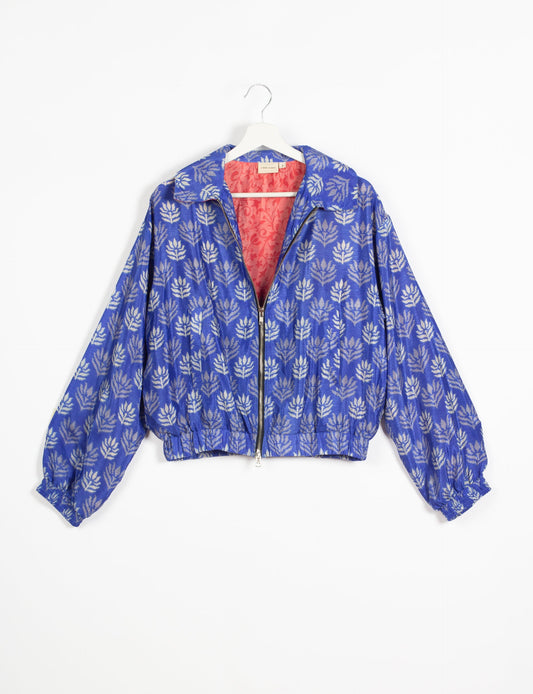 Stylish BOMBER JACKET, an upcycled clothing masterpiece with a cute cropped shape, elasticated details, and detachable metallic zipper. Contrast sari print lining adds a unique touch. Explore sustainable and eco-friendly fashion.