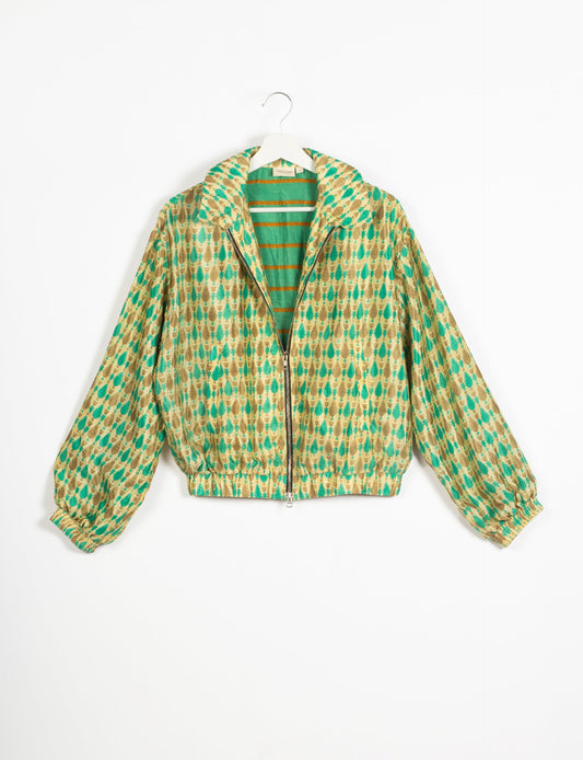 Stylish BOMBER JACKET, an upcycled clothing masterpiece with a cute cropped shape, elasticated details, and detachable metallic zipper. Contrast sari print lining adds a unique touch. Explore sustainable and eco-friendly fashion.