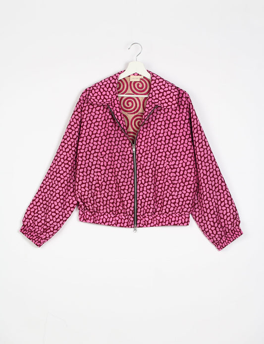 Stylish BOMBER JACKET, an upcycled clothing masterpiece with a cute cropped shape, elasticated details, and detachable metallic zipper. Contrast sari print lining adds a unique touch. Explore sustainable and eco-friendly fashion.