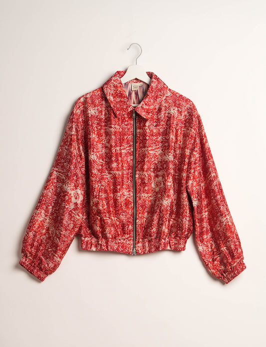 Stylish BOMBER JACKET, an upcycled clothing masterpiece with a cute cropped shape, elasticated details, and detachable metallic zipper. Contrast sari print lining adds a unique touch. Explore sustainable and eco-friendly fashion.