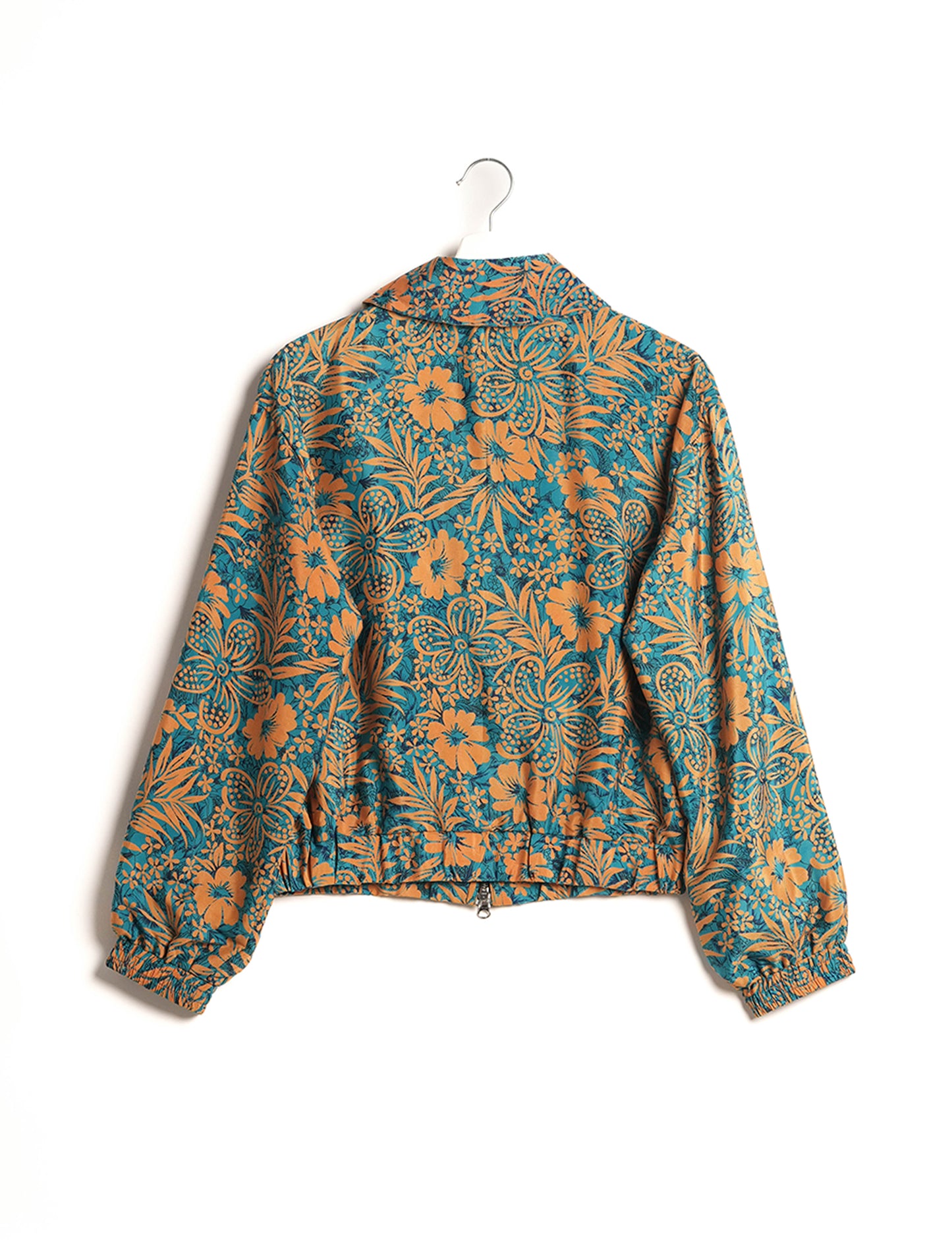 Stylish BOMBER JACKET, an upcycled clothing masterpiece with a cute cropped shape, elasticated details, and detachable metallic zipper. Contrast sari print lining adds a unique touch. Explore sustainable and eco-friendly fashion.