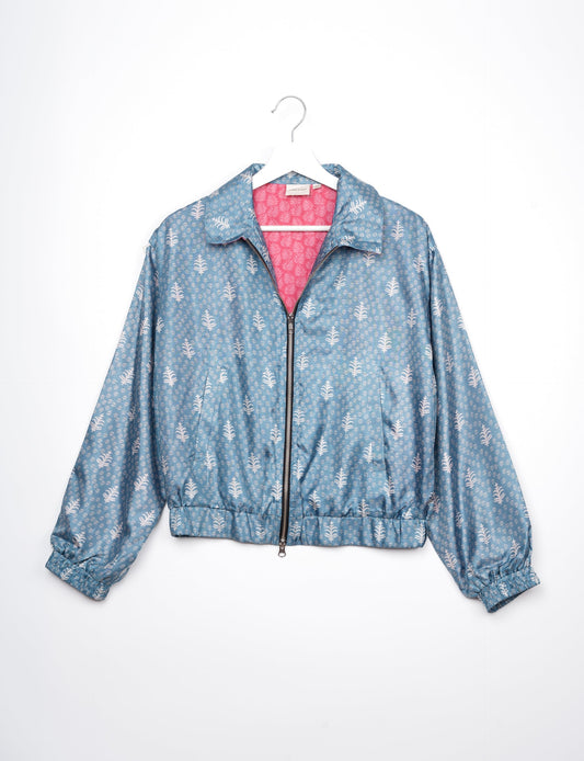 Stylish BOMBER JACKET, an upcycled clothing masterpiece with a cute cropped shape, elasticated details, and detachable metallic zipper. Contrast sari print lining adds a unique touch. Explore sustainable and eco-friendly fashion.