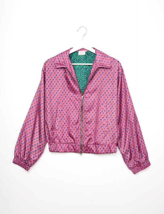 Stylish BOMBER JACKET, an upcycled clothing masterpiece with a cute cropped shape, elasticated details, and detachable metallic zipper. Contrast sari print lining adds a unique touch. Explore sustainable and eco-friendly fashion.