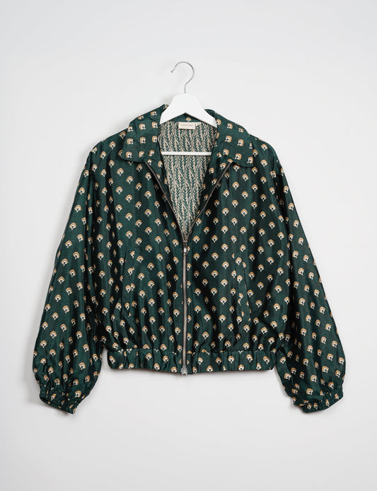 Stylish BOMBER JACKET, an upcycled clothing masterpiece with a cute cropped shape, elasticated details, and detachable metallic zipper. Contrast sari print lining adds a unique touch. Explore sustainable and eco-friendly fashion.