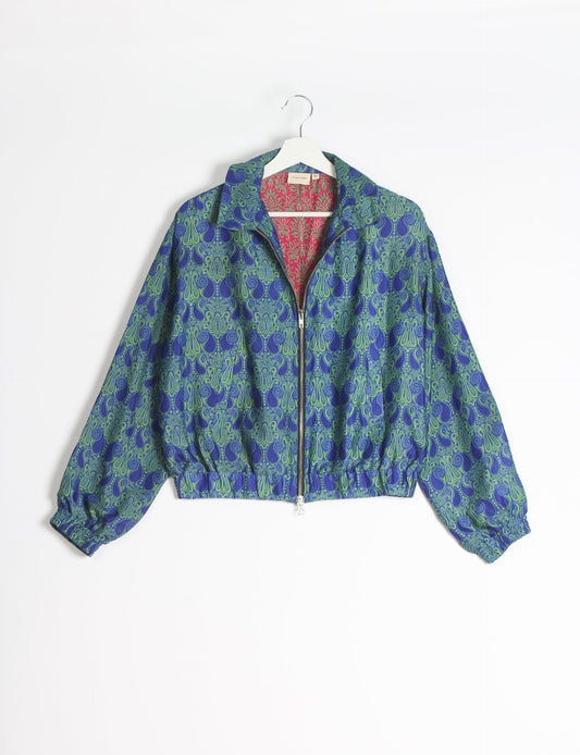 Stylish BOMBER JACKET, an upcycled clothing masterpiece with a cute cropped shape, elasticated details, and detachable metallic zipper. Contrast sari print lining adds a unique touch. Explore sustainable and eco-friendly fashion.