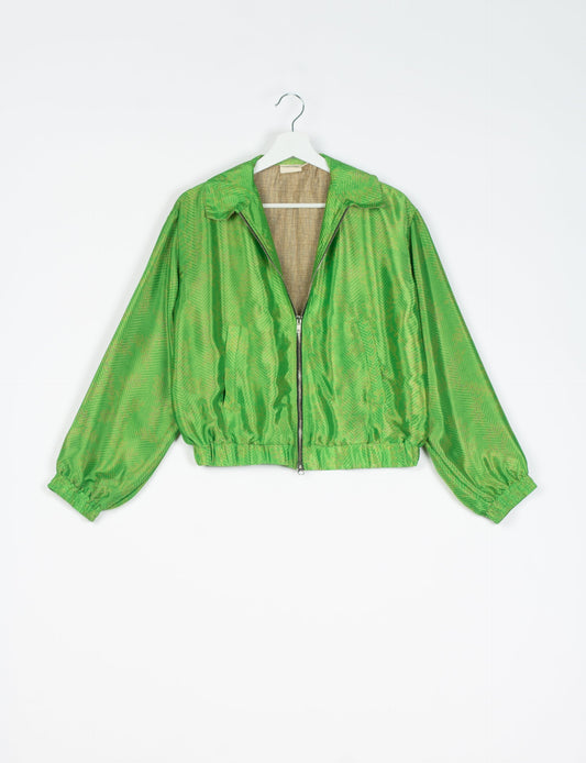 Stylish BOMBER JACKET, an upcycled clothing masterpiece with a cute cropped shape, elasticated details, and detachable metallic zipper. Contrast sari print lining adds a unique touch. Explore sustainable and eco-friendly fashion.