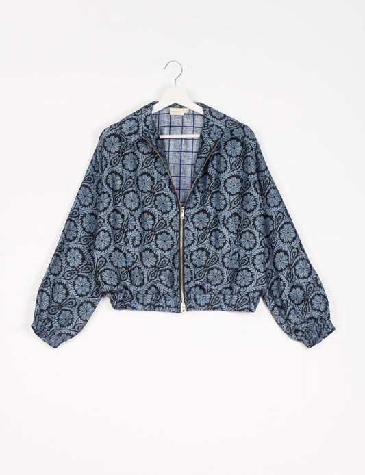 Stylish BOMBER JACKET, an upcycled clothing masterpiece with a cute cropped shape, elasticated details, and detachable metallic zipper. Contrast sari print lining adds a unique touch. Explore sustainable and eco-friendly fashion.