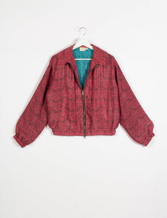 Stylish BOMBER JACKET, an upcycled clothing masterpiece with a cute cropped shape, elasticated details, and detachable metallic zipper. Contrast sari print lining adds a unique touch. Explore sustainable and eco-friendly fashion.