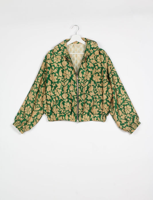 Stylish BOMBER JACKET, an upcycled clothing masterpiece with a cute cropped shape, elasticated details, and detachable metallic zipper. Contrast sari print lining adds a unique touch. Explore sustainable and eco-friendly fashion.