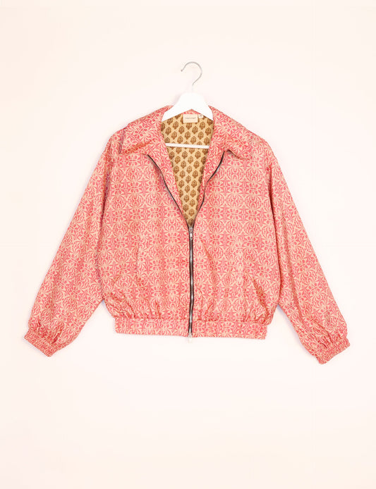 Stylish BOMBER JACKET, an upcycled clothing masterpiece with a cute cropped shape, elasticated details, and detachable metallic zipper. Contrast sari print lining adds a unique touch. Explore sustainable and eco-friendly fashion.