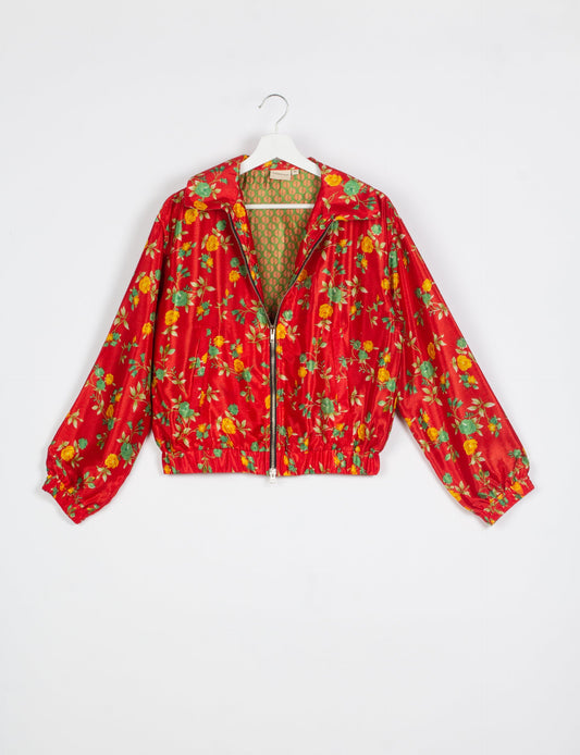 Stylish BOMBER JACKET, an upcycled clothing masterpiece with a cute cropped shape, elasticated details, and detachable metallic zipper. Contrast sari print lining adds a unique touch. Explore sustainable and eco-friendly fashion.