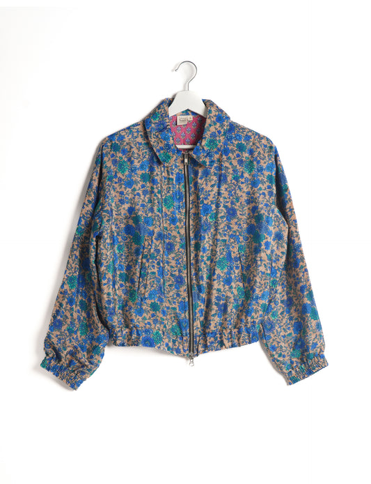 Stylish BOMBER JACKET, an upcycled clothing masterpiece with a cute cropped shape, elasticated details, and detachable metallic zipper. Contrast sari print lining adds a unique touch. Explore sustainable and eco-friendly fashion.