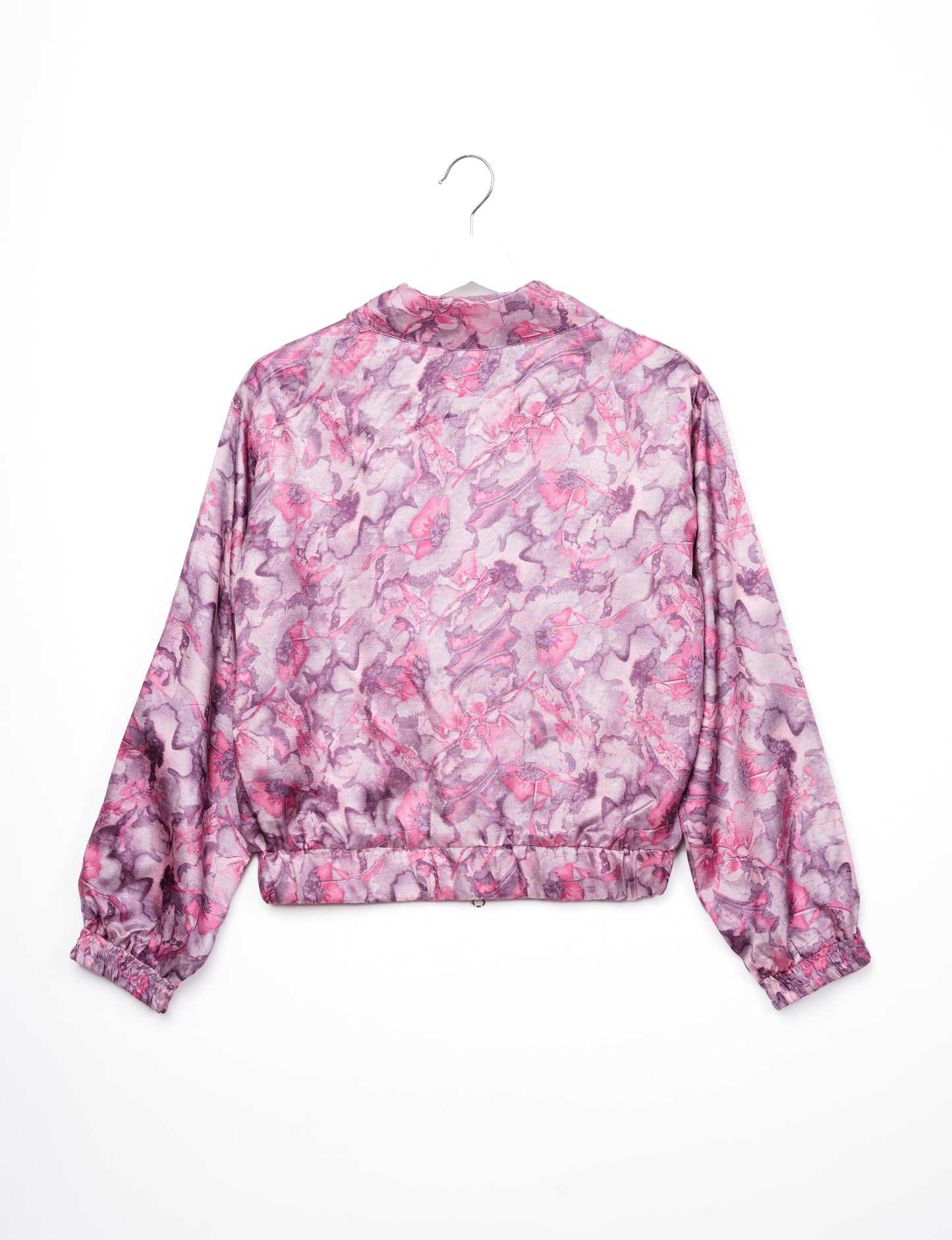 Stylish BOMBER JACKET, an upcycled clothing masterpiece with a cute cropped shape, elasticated details, and detachable metallic zipper. Contrast sari print lining adds a unique touch. Explore sustainable and eco-friendly fashion.