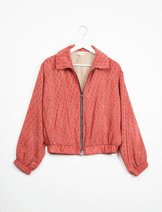 Stylish BOMBER JACKET, an upcycled clothing masterpiece with a cute cropped shape, elasticated details, and detachable metallic zipper. Contrast sari print lining adds a unique touch. Explore sustainable and eco-friendly fashion.