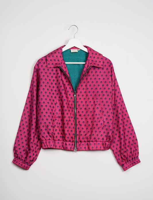 Stylish BOMBER JACKET, an upcycled clothing masterpiece with a cute cropped shape, elasticated details, and detachable metallic zipper. Contrast sari print lining adds a unique touch. Explore sustainable and eco-friendly fashion.