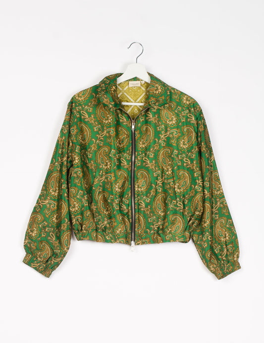 Stylish BOMBER JACKET, an upcycled clothing masterpiece with a cute cropped shape, elasticated details, and detachable metallic zipper. Contrast sari print lining adds a unique touch. Explore sustainable and eco-friendly fashion.