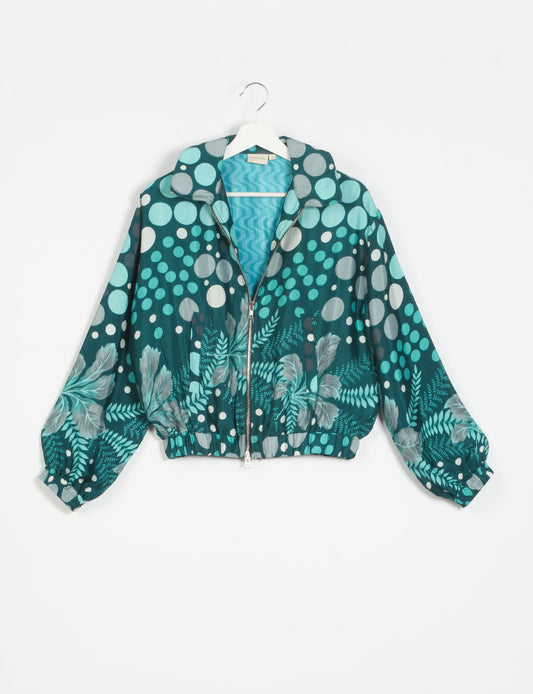 Stylish BOMBER JACKET, an upcycled clothing masterpiece with a cute cropped shape, elasticated details, and detachable metallic zipper. Contrast sari print lining adds a unique touch. Explore sustainable and eco-friendly fashion.