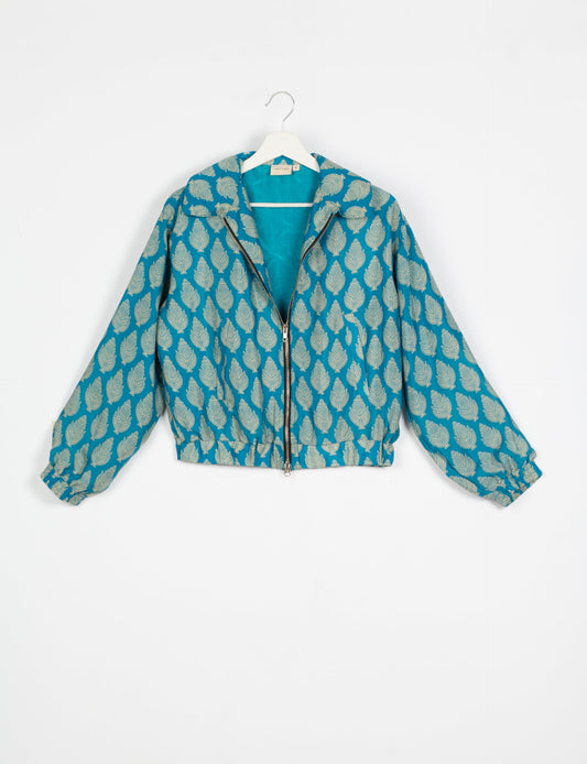 Stylish BOMBER JACKET, an upcycled clothing masterpiece with a cute cropped shape, elasticated details, and detachable metallic zipper. Contrast sari print lining adds a unique touch. Explore sustainable and eco-friendly fashion.