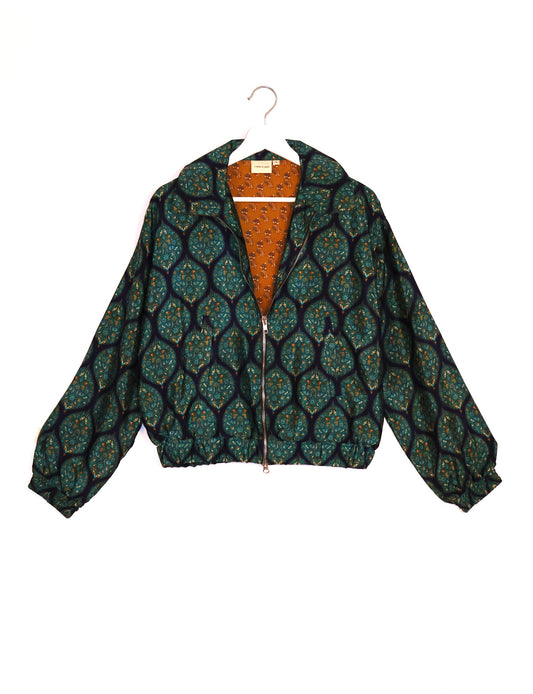 Stylish BOMBER JACKET, an upcycled clothing masterpiece with a cute cropped shape, elasticated details, and detachable metallic zipper. Contrast sari print lining adds a unique touch. Explore sustainable and eco-friendly fashion.