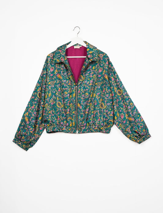 Stylish BOMBER JACKET, an upcycled clothing masterpiece with a cute cropped shape, elasticated details, and detachable metallic zipper. Contrast sari print lining adds a unique touch. Explore sustainable and eco-friendly fashion.