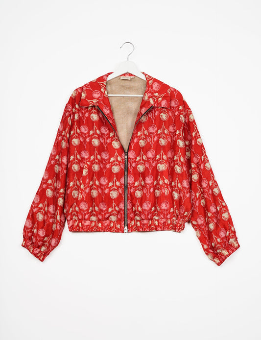 Stylish BOMBER JACKET, an upcycled clothing masterpiece with a cute cropped shape, elasticated details, and detachable metallic zipper. Contrast sari print lining adds a unique touch. Explore sustainable and eco-friendly fashion.