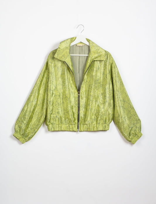 Stylish BOMBER JACKET, an upcycled clothing masterpiece with a cute cropped shape, elasticated details, and detachable metallic zipper. Contrast sari print lining adds a unique touch. Explore sustainable and eco-friendly fashion.