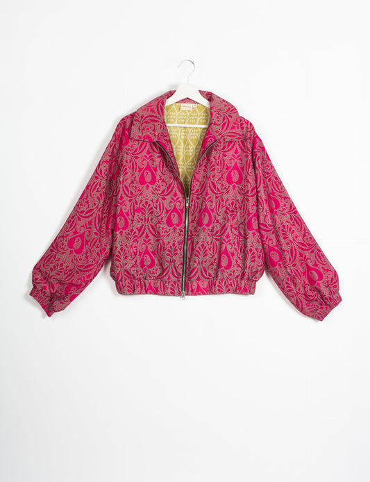 Stylish BOMBER JACKET, an upcycled clothing masterpiece with a cute cropped shape, elasticated details, and detachable metallic zipper. Contrast sari print lining adds a unique touch. Explore sustainable and eco-friendly fashion.