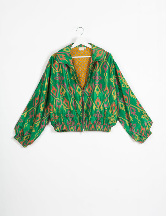 Stylish BOMBER JACKET, an upcycled clothing masterpiece with a cute cropped shape, elasticated details, and detachable metallic zipper. Contrast sari print lining adds a unique touch. Explore sustainable and eco-friendly fashion.