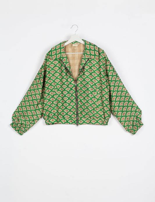 Stylish BOMBER JACKET, an upcycled clothing masterpiece with a cute cropped shape, elasticated details, and detachable metallic zipper. Contrast sari print lining adds a unique touch. Explore sustainable and eco-friendly fashion.