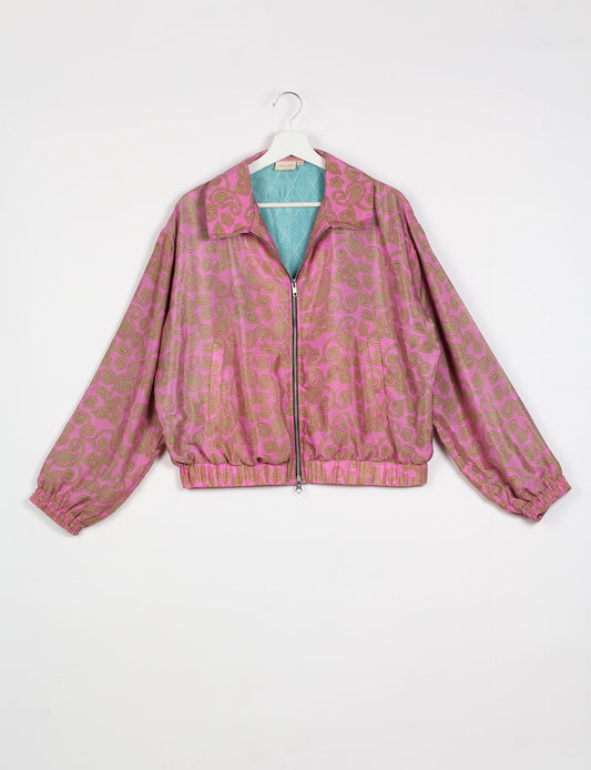 Stylish BOMBER JACKET, an upcycled clothing masterpiece with a cute cropped shape, elasticated details, and detachable metallic zipper. Contrast sari print lining adds a unique touch. Explore sustainable and eco-friendly fashion.