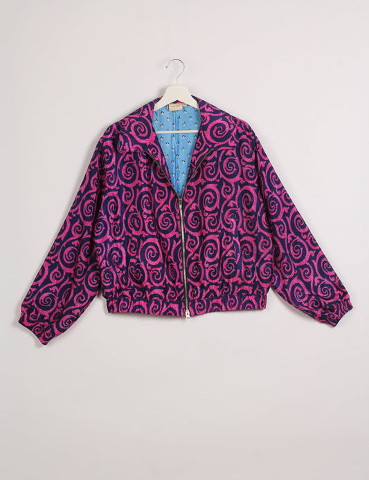 Stylish BOMBER JACKET, an upcycled clothing masterpiece with a cute cropped shape, elasticated details, and detachable metallic zipper. Contrast sari print lining adds a unique touch. Explore sustainable and eco-friendly fashion.