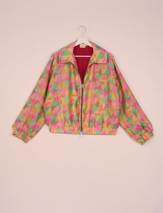 Stylish BOMBER JACKET, an upcycled clothing masterpiece with a cute cropped shape, elasticated details, and detachable metallic zipper. Contrast sari print lining adds a unique touch. Explore sustainable and eco-friendly fashion.