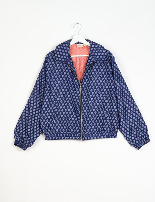 Stylish BOMBER JACKET, an upcycled clothing masterpiece with a cute cropped shape, elasticated details, and detachable metallic zipper. Contrast sari print lining adds a unique touch. Explore sustainable and eco-friendly fashion.