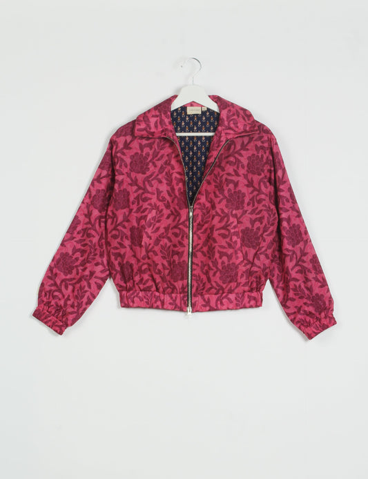 Stylish BOMBER JACKET, an upcycled clothing masterpiece with a cute cropped shape, elasticated details, and detachable metallic zipper. Contrast sari print lining adds a unique touch. Explore sustainable and eco-friendly fashion.