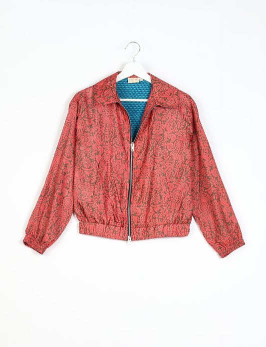 Stylish BOMBER JACKET, an upcycled clothing masterpiece with a cute cropped shape, elasticated details, and detachable metallic zipper. Contrast sari print lining adds a unique touch. Explore sustainable and eco-friendly fashion.