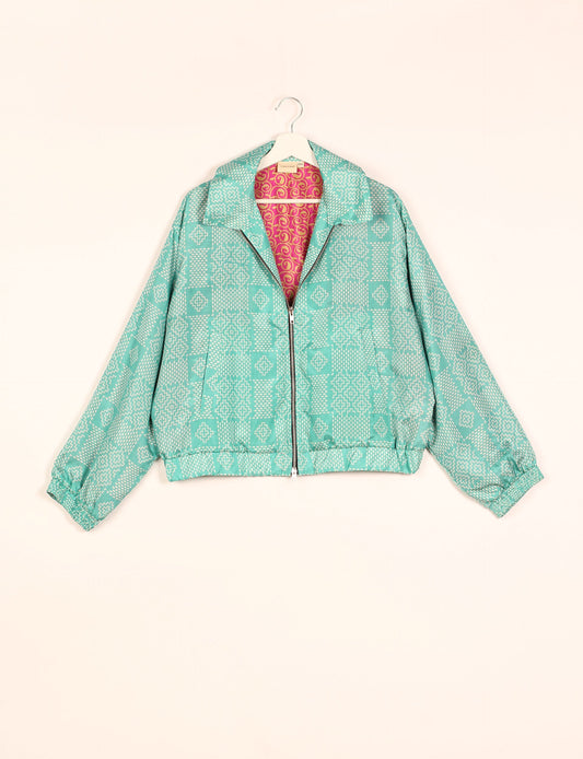 Stylish BOMBER JACKET, an upcycled clothing masterpiece with a cute cropped shape, elasticated details, and detachable metallic zipper. Contrast sari print lining adds a unique touch. Explore sustainable and eco-friendly fashion.