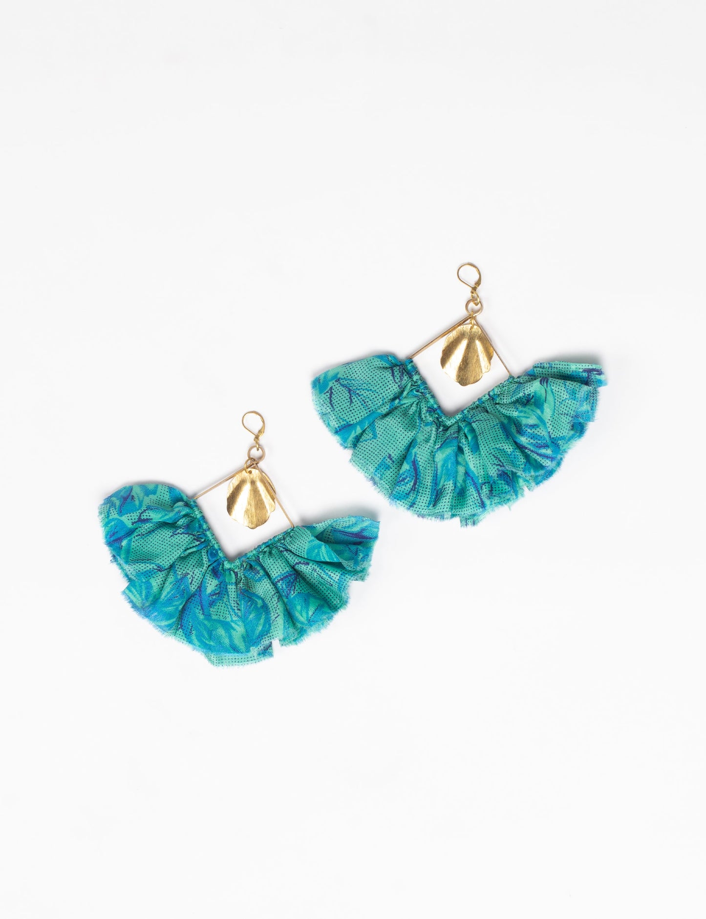 Bold and distinctive MAXI SQUARE EARRINGS – dramatic accessories with fabric frill, metallic charm, and a raw edge. Hypoallergy tested, skin-friendly metal hooks make these earrings unique and glamorous. Elevate your style with these eye-catching, nickel, and lead-free accessories.