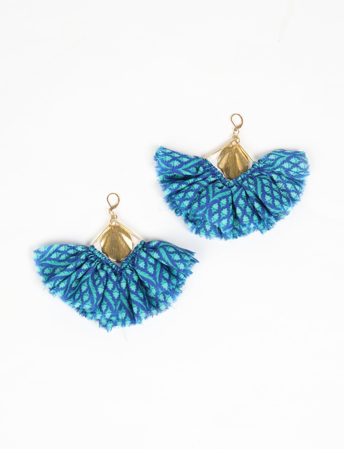 Bold and distinctive MAXI SQUARE EARRINGS – dramatic accessories with fabric frill, metallic charm, and a raw edge. Hypoallergy tested, skin-friendly metal hooks make these earrings unique and glamorous. Elevate your style with these eye-catching, nickel, and lead-free accessories.